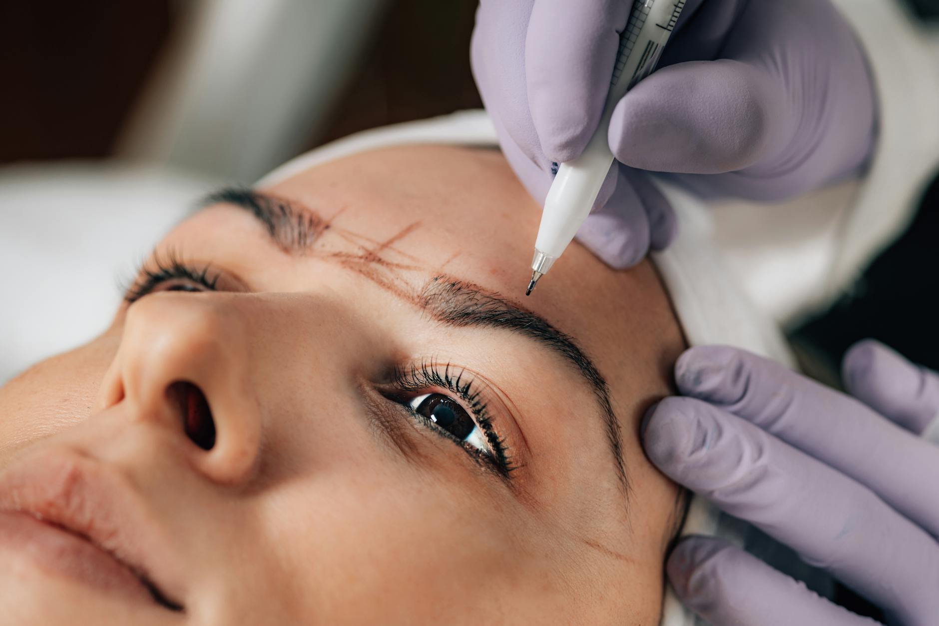 Microblading transformation — hair-stroke brow technique